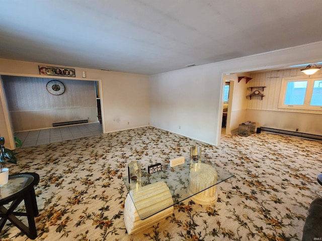 living room with carpet floors and a baseboard heating unit