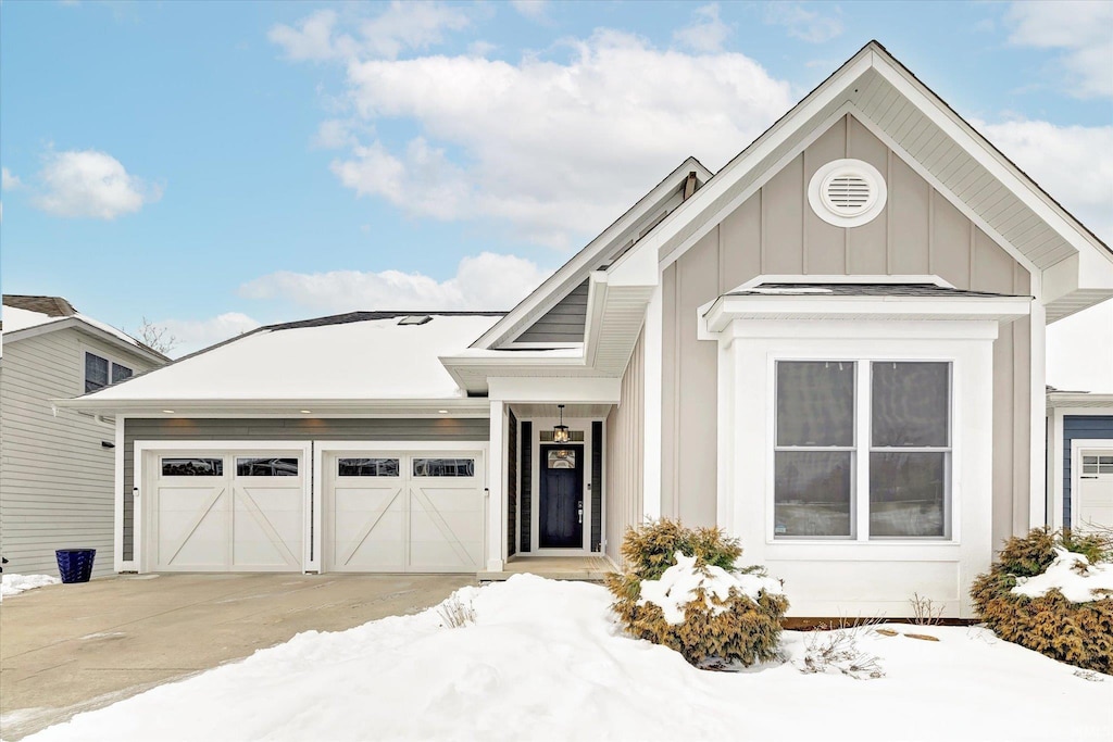 view of front of property with a garage