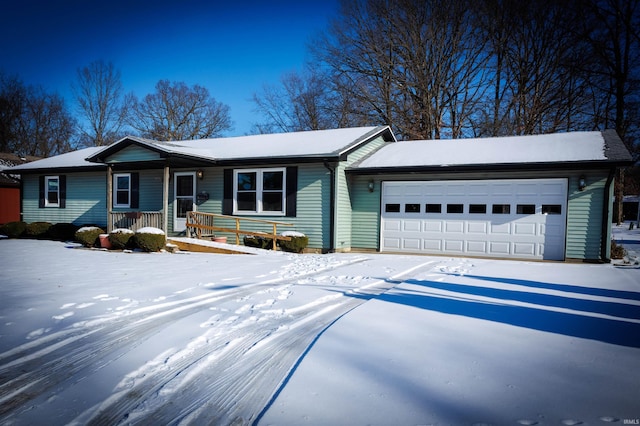 ranch-style home with a porch and a garage