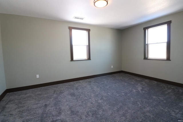 view of carpeted spare room