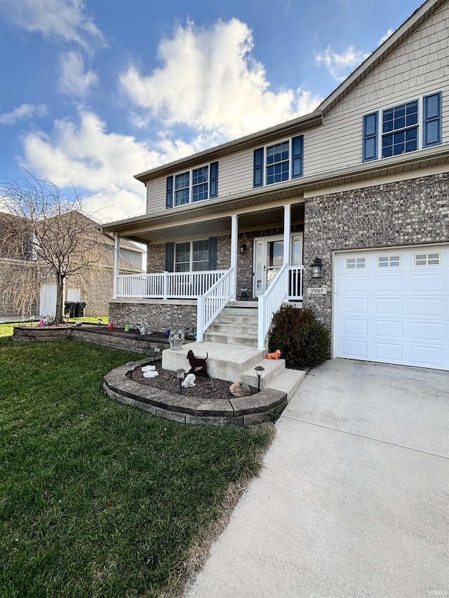 view of front of property with covered porch, a front lawn, and a garage