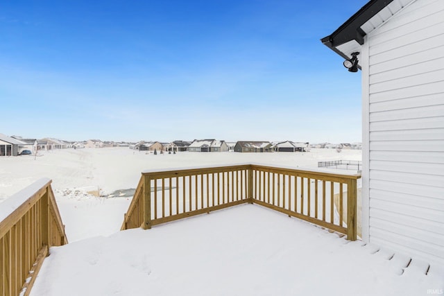 view of snow covered deck