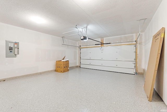 garage with electric panel and a garage door opener