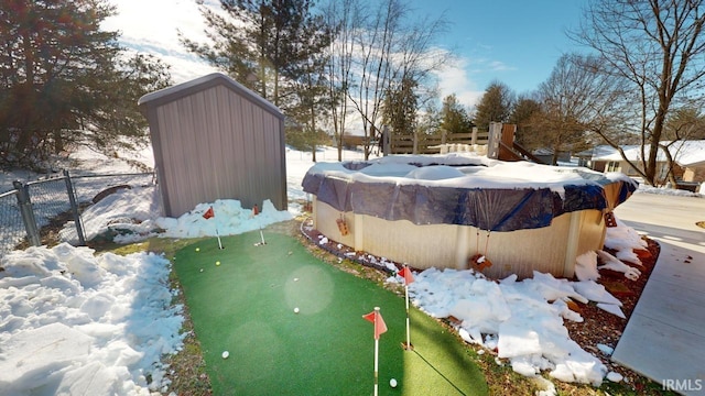 view of yard covered in snow