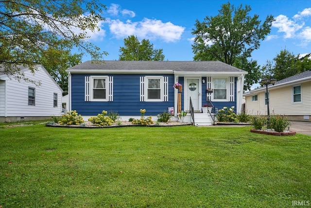 view of front of home featuring a front yard