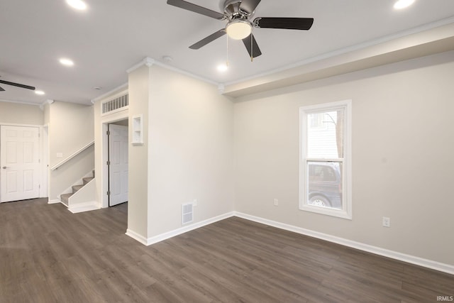 interior space featuring ornamental molding, ceiling fan, and dark hardwood / wood-style floors