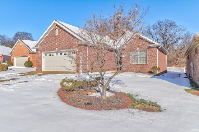 front facade with a garage