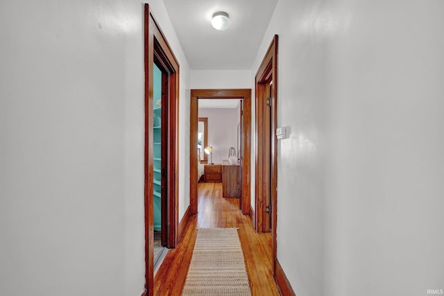 corridor featuring light wood-type flooring