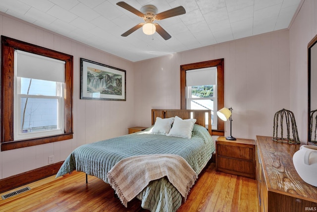 bedroom featuring ceiling fan and light wood-type flooring