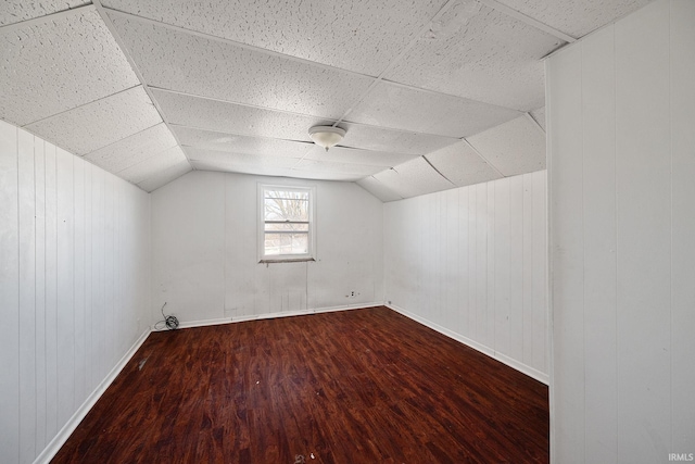 bonus room featuring hardwood / wood-style floors and vaulted ceiling