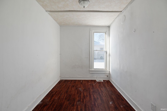 unfurnished room with hardwood / wood-style floors