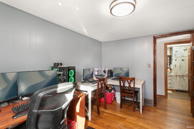 home office featuring light hardwood / wood-style flooring