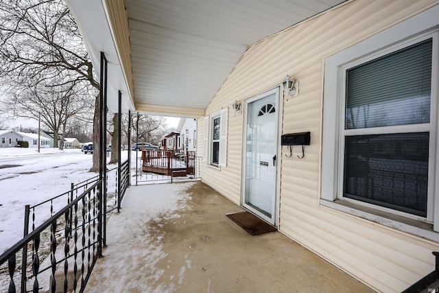 view of snow covered patio