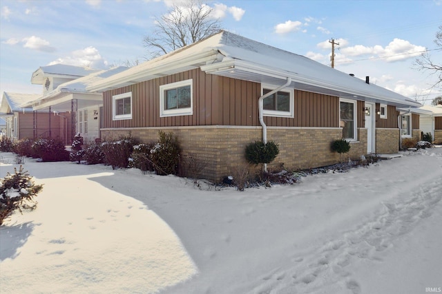 view of snow covered property