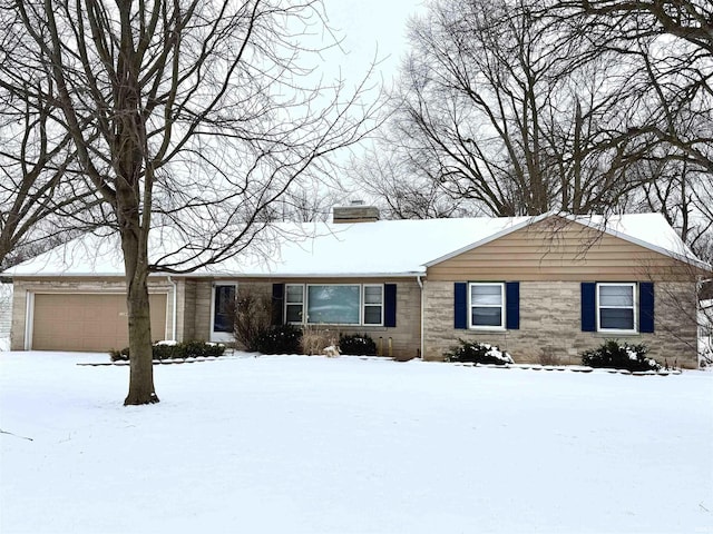 single story home with a garage