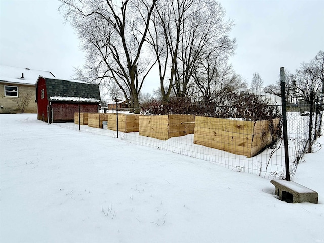 view of yard covered in snow