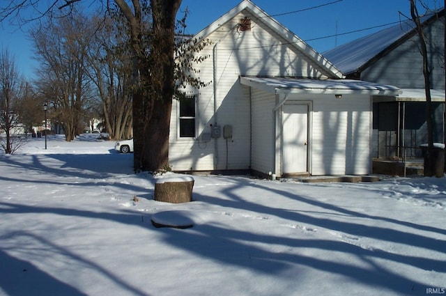 view of snow covered property