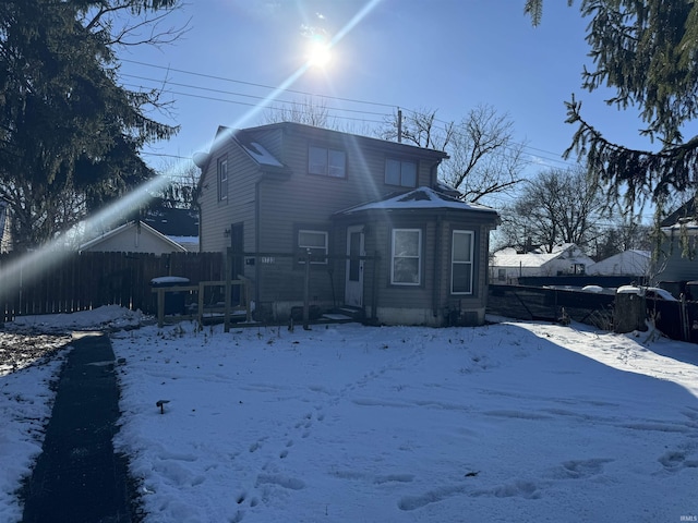 view of snow covered property