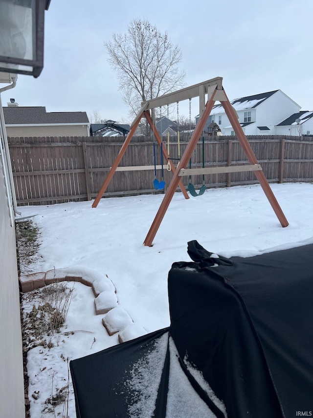 view of snow covered playground