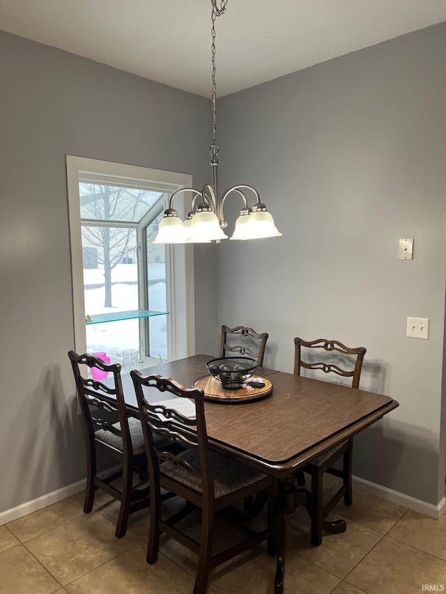 dining room featuring light tile patterned flooring