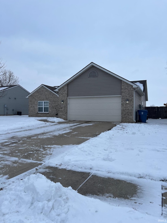 view of front of property featuring a garage