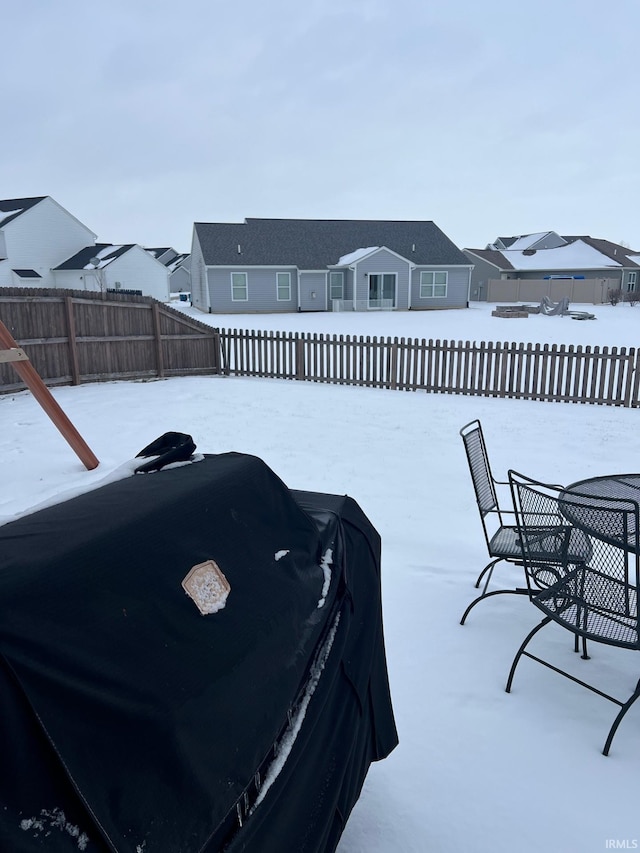 view of yard covered in snow