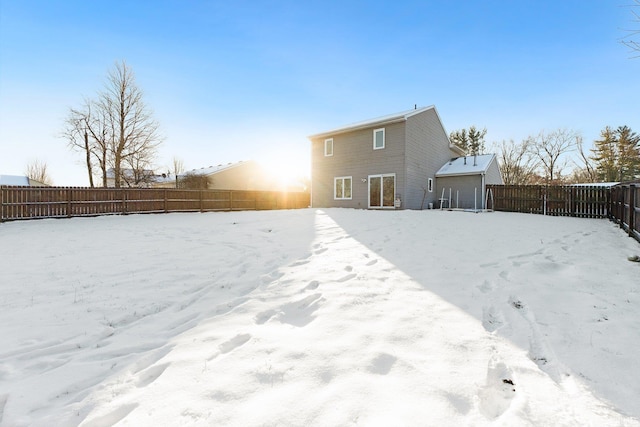 view of snow covered property