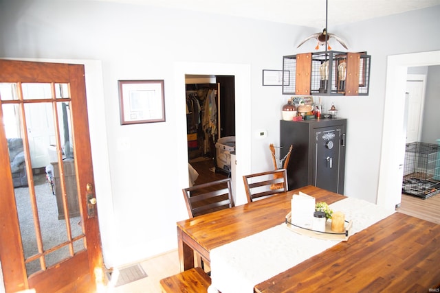 dining room with hardwood / wood-style flooring