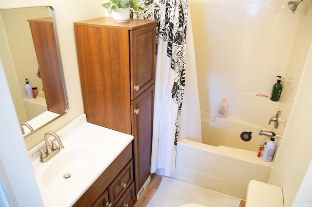 bathroom with shower / bath combination with curtain and vanity