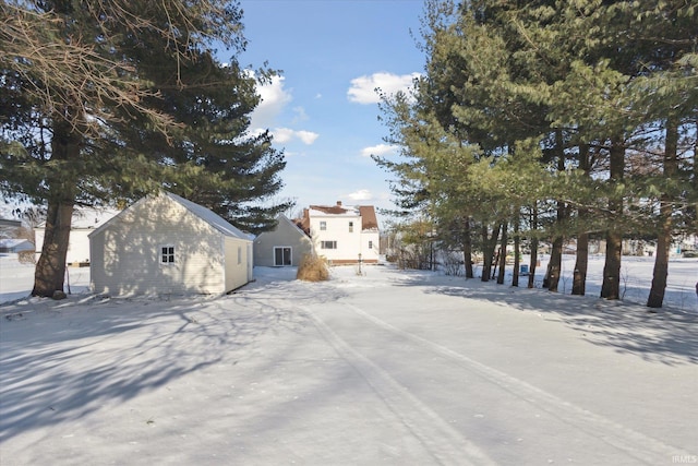 exterior space with a shed