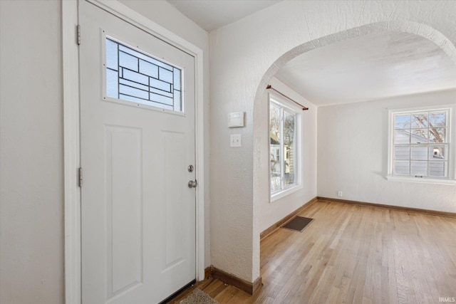 foyer with light hardwood / wood-style floors