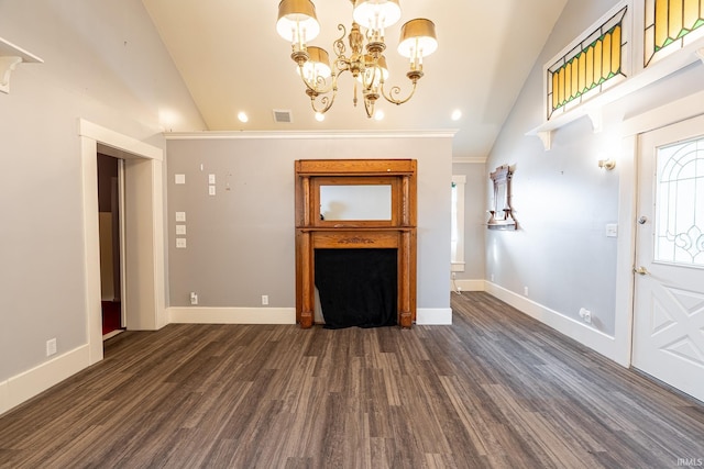 unfurnished living room with lofted ceiling, dark hardwood / wood-style flooring, and a chandelier