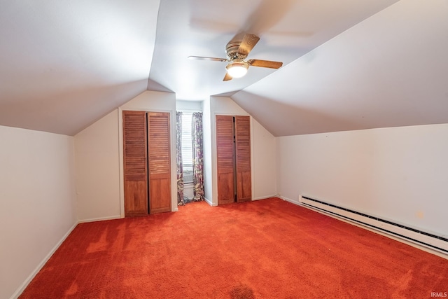 additional living space featuring ceiling fan, light colored carpet, a baseboard heating unit, and lofted ceiling