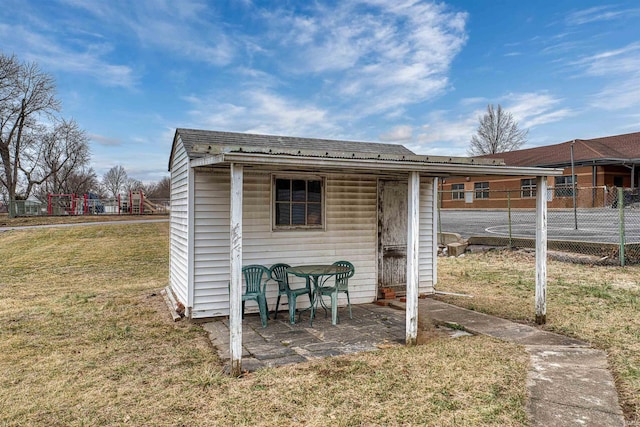 view of outdoor structure with a yard