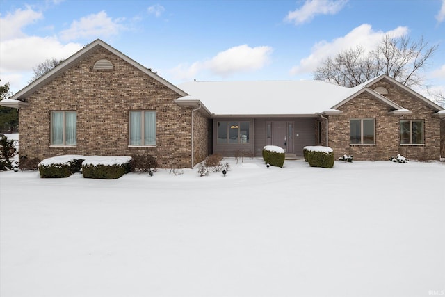 view of snow covered property