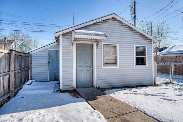 exterior space with an outbuilding