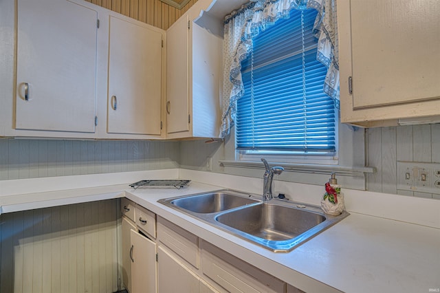 kitchen with sink and radiator heating unit