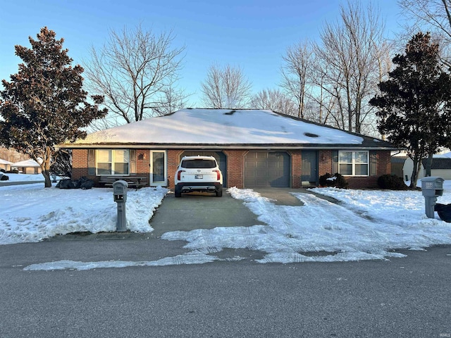 single story home with a garage