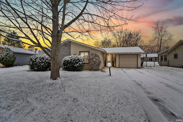 single story home featuring a garage