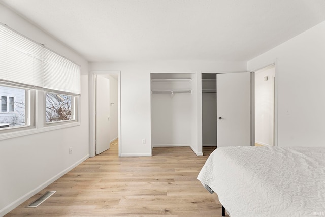 bedroom featuring light hardwood / wood-style flooring