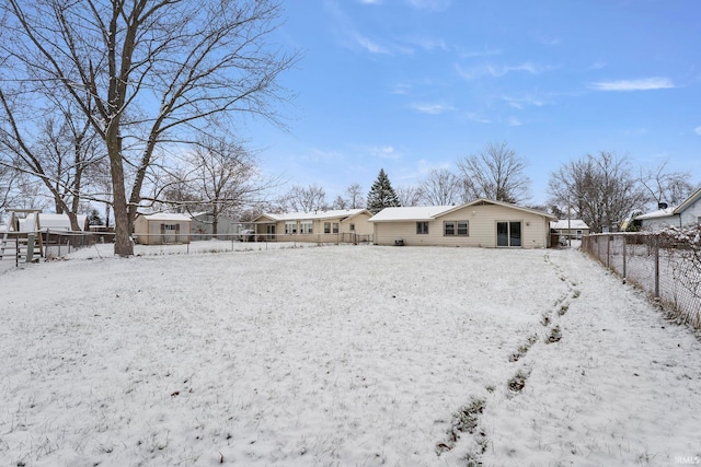 view of yard covered in snow