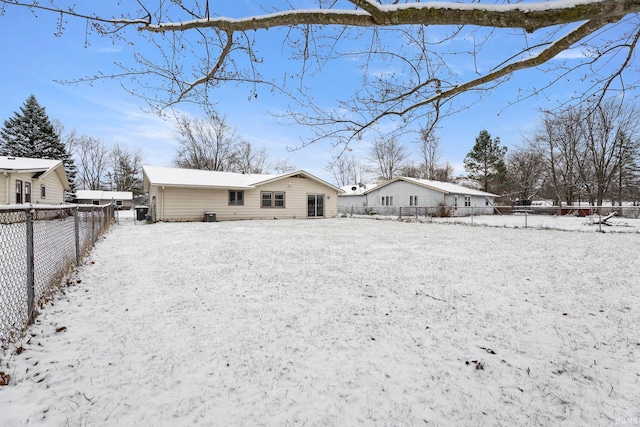 view of snow covered property