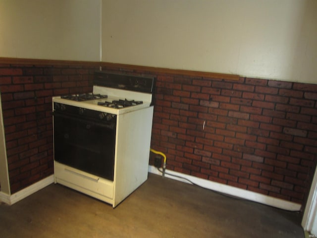 kitchen featuring white gas range