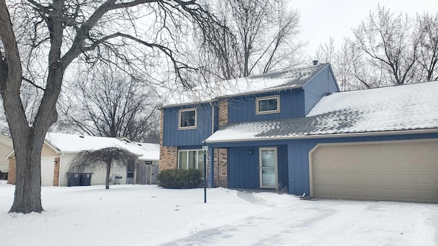 front of property featuring a garage