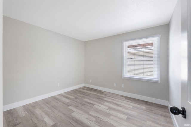 empty room featuring light hardwood / wood-style flooring