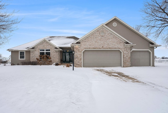 view of front of home featuring a garage