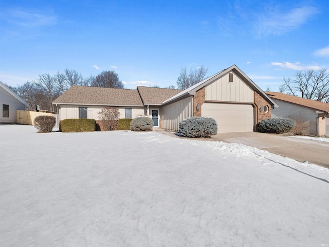 single story home with a garage