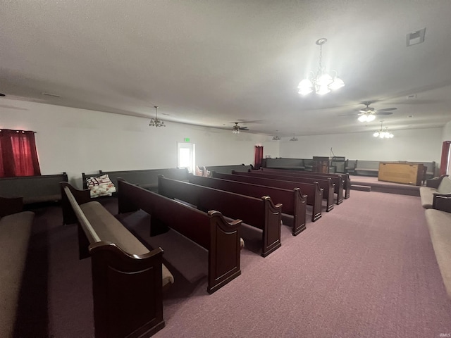 misc room featuring a notable chandelier and carpet flooring