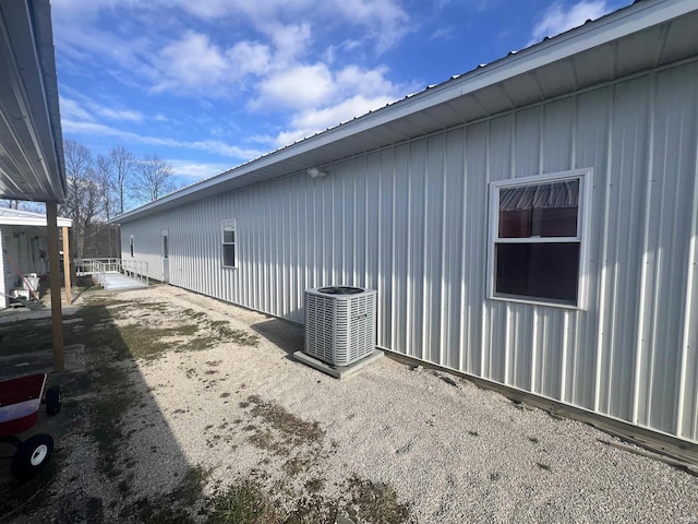 view of property exterior with central air condition unit