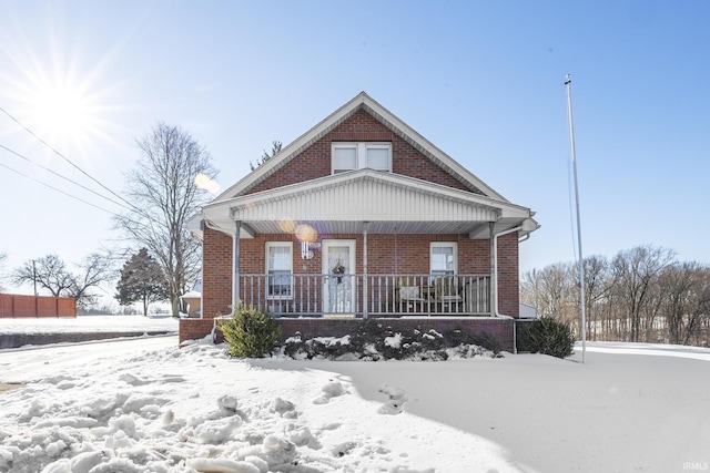 view of front of home featuring covered porch